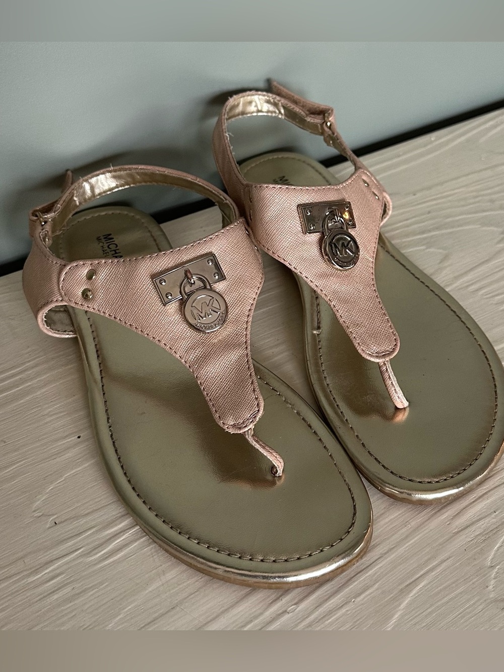 Michael Kors Rose Gold T‑Strap Logo Sandals